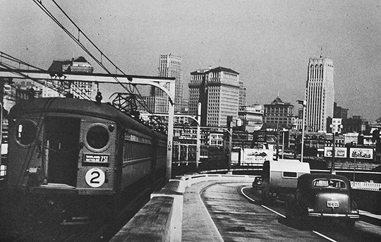 Southern Pacific electric train across the Bay Bridge, San Francisco; photo by Seymour Snaer